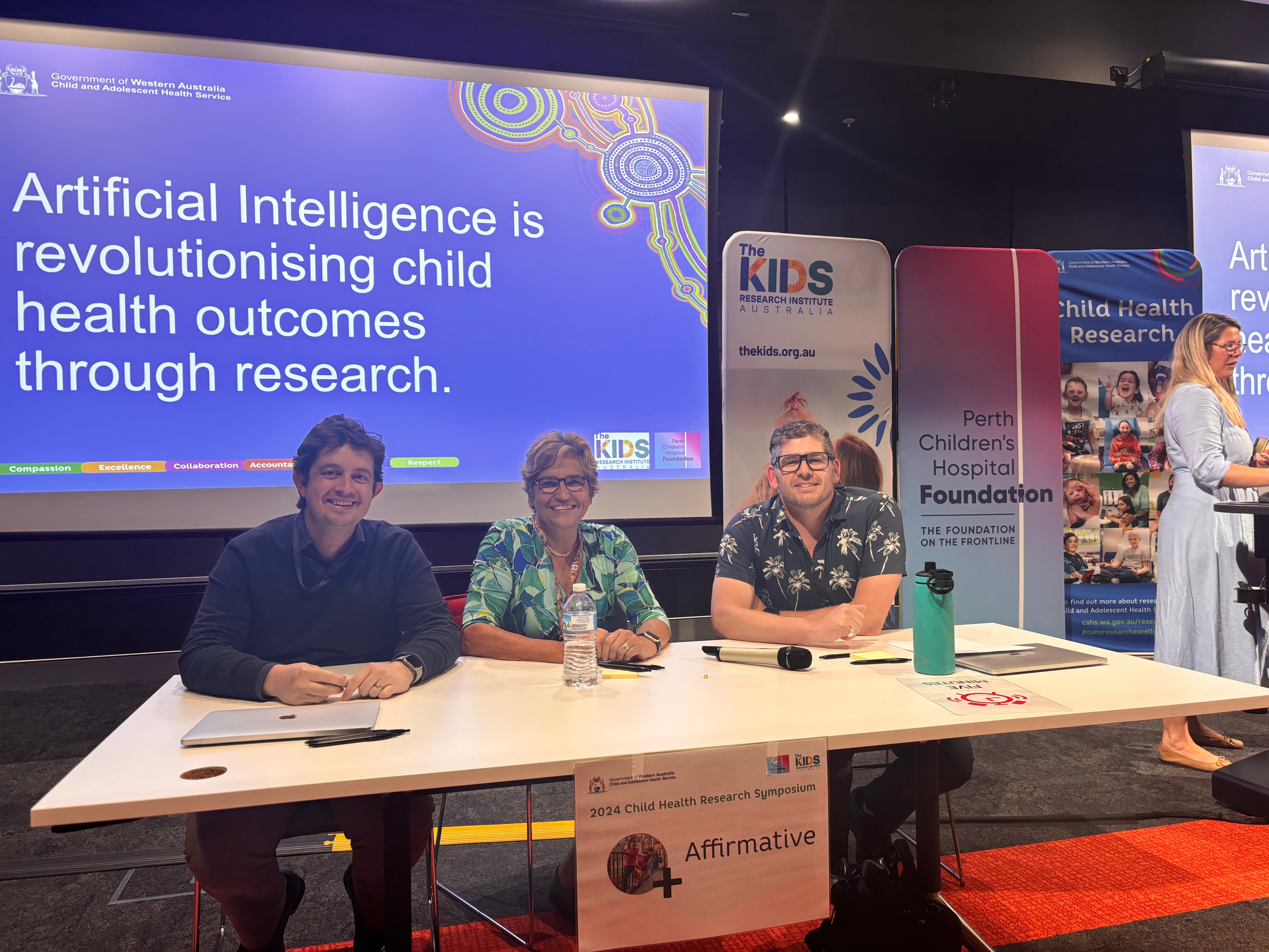 From left to right, Dr Rob Lethbridge, Professor Desiree Silva and Dr Matt Cooper sitting at their debate table